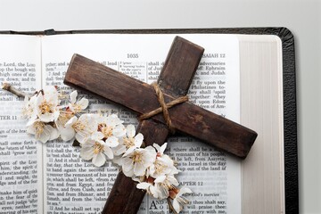 Poster - Holy Bible book, cross on light background