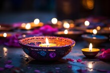 A Lit Candles In A Bowl