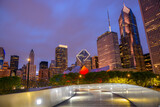 Fototapeta Big Ben - Nigh view of Chicago  skyline as seen from an illuminated winding walkway over Millennium Park