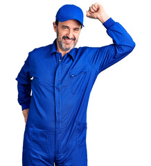 Poster - Middle age handsome man wearing mechanic uniform smiling confident touching hair with hand up gesture, posing attractive and fashionable