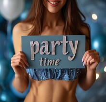 A Woman In Blue Top Is Holding A Blue Banner With "party Time" Written In Grey Letters. Get Ready To Celebrate!