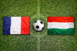 France vs. Hungary flags on soccer field