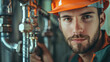 A handsome young male plumber repairing water pipe of modern home, closeup portrait, professional handyman for the house, repairs with tools.