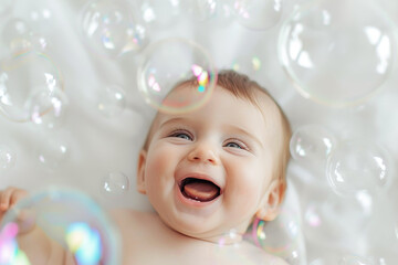 Wall Mural - A baby is laying on a bed with bubbles surrounding him