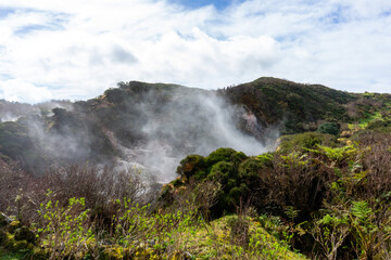 Surreal landscape of sulfur fumaroles at Terceira Island, Azores. Captivating natural wonders amid volcanic terrain.