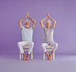 two eldery people practicing chair yoga