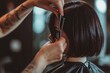 A skilled individual is cutting another persons hair using a comb, ensuring precise and accurate haircuts, A hairdresser giving a client a trendy blunt bob haircut, AI Generated