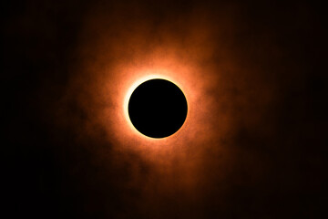 Wall Mural - Eclipse re construction in a studio using a bright flashlight and a round cap with a bit of atmospheric spray