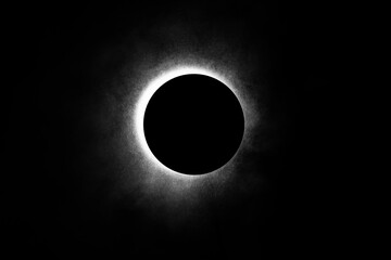 Wall Mural - Eclipse re construction in a studio using a bright flashlight and a round cap with a bit of atmospheric spray