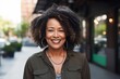 © CojanAI - Portrait of a confident middle aged African American woman smiling outdoors