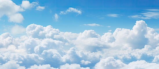 Wall Mural - the natural landscape featured a vibrant blue sky with fluffy white cumulus clouds, creating an elec