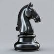 a chess knight symbol in a deep, matte black, positioned against a contrasting light grey background, symbolizing strategy and intellect
