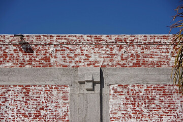 Wall Mural - Wall of a warehouse brick building retrofit for earthquake