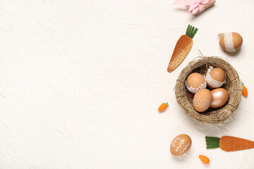 Canvas Print - Nest with Easter eggs and carrots on white background