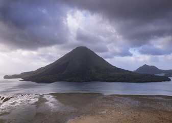 Wall Mural - Gunung Api volcano island coast at low tide in Bandaneira, Banda islands, Maluku