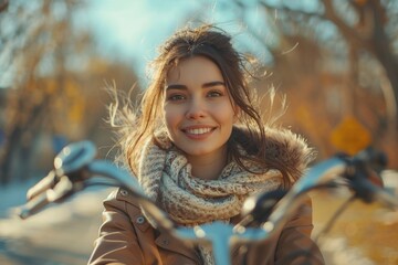 Wall Mural - Happy young woman riding bicycle in park at spring.