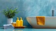 Stylized bathroom with bold blue walls and decor. Artful interior design of a bathroom with a partial view of a trendy bathtub, bold blue walls, and yellow containers