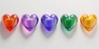 Heart shapes in rainbow colors, reflecting love and pride in diversity.