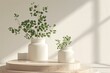 White vase with eucalyptus leaves on a wooden stand