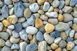 Colorful stone pebbles background texture, closeup of photo