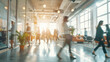 © Thanos - Blurred Motion of People in Office
