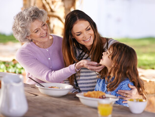 Poster - Family, eating or smile in garden for breakfast with love, gathering or bonding with nutrition or wellness. Grandma, mother or child together in backyard or patio in morning for healthy meal or food