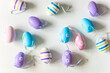 Various multicolored easter eggs on a white background;