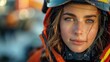 © Julia Jones - Female firefighter with helmet in front of fire. Close-up portrait with vivid sparks and flames.