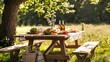 © Julia Jones - Picnic table with checkered cloth in sunny forest clearing.