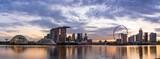 Fototapeta Miasto - Wide panorama of CBD area in Singapore at dusk.