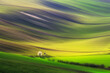 Beautiful lines of Moravian Tuscany. An agricultural landscape at sunset. Sown fields in spring. 