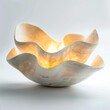 Elegant accent lighting piece, glowing softly, highlighting textures, isolated white background