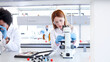 © PeopleVideos - Female scientists working at the lab