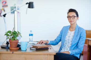 Sticker - Business woman, confidence and portrait at computer for creative project, planning or copywriting career. Face of a young professional editor, writer or person in glasses at desktop for startup