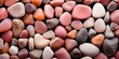 Pink and gray stones, pebble texture, gravel,full frame, top view on stone background