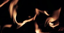 Sepia Colored Wood Fire. Background Of A Vintage Fireplace Fire. Log Fire In Retro Colors. Close Up Of A Fireplace Fire