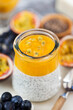 Chia pudding with  yogurt, mango and passion fruit, healthy breakfast or dessert