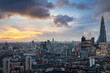 Elevated view of the London skyline during a cloudy winter sunset, England