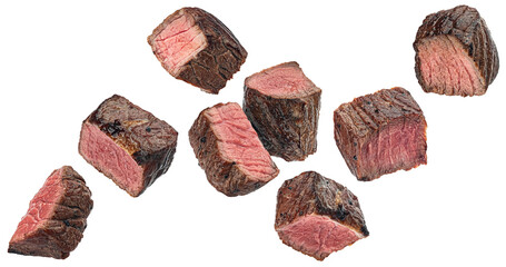 Wall Mural - medium rare steak pieces, sliced grilled beef cubes isolated on white background