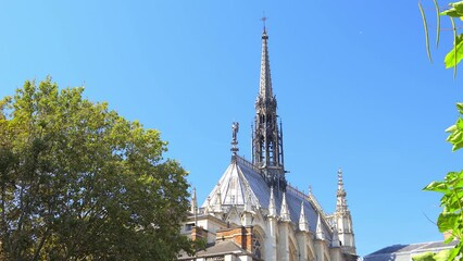 Poster - Apse and spire of the Sainte-Chapelle church on sunny day in Paris, France