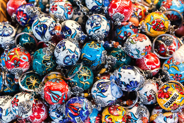 Wall Mural - Traditional Turkish ceramic keychains, boasting intricate Iznik designs in a bold palette. Istanbul, Turkey (Turkiye)