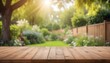 The empty wooden table top with blur background of garden Exuberant