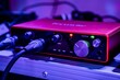 © Wirestock - Closeup shot of the audio interface with 2 XLR cables.
