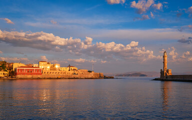 Wall Mural - Panorama of picturesque old port of Chania is one of landmarks and tourist destinations of Crete island in the morning on sunrise. Chania, Crete, Greece