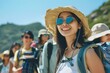 Happy group young asian american tourists woman wearing beach hat, sunglasses and backpacks going to travel on holidays on mountains background