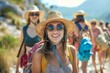 Happy group young irish american tourists woman wearing beach hat, sunglasses and backpacks going to travel on holidays on mountains background