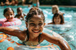 © igorfrost - group of diverse children in swimming pool with inflatable ring circles, smiling kids wearing swimwear at outdoor summer pool party portrait