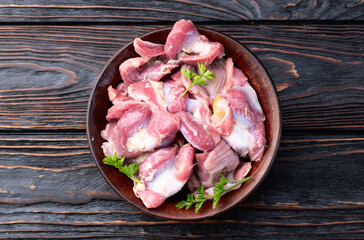 Poster - Raw chicken giblets gizzard ( stomach ) , meat background