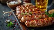 Warm kitchen scene of savory sausages beside chilled beer