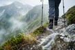 person with walking poles on a steep mountain path